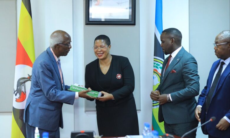 Auditor General handing over his report to Speaker Antah Among on 9th January 2024 780x470 1