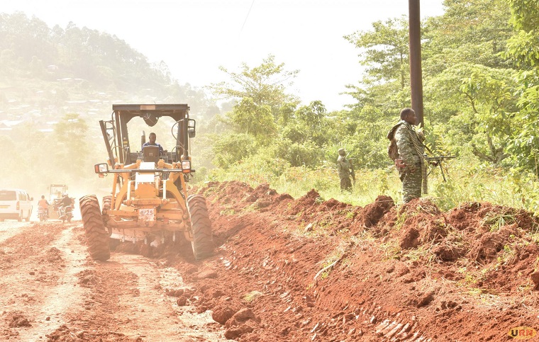 UPDF keep guard in DRC during road works