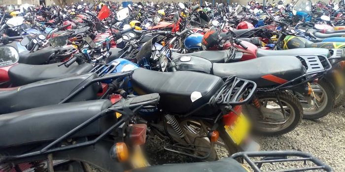 Undated photo of motorcycles at a yard